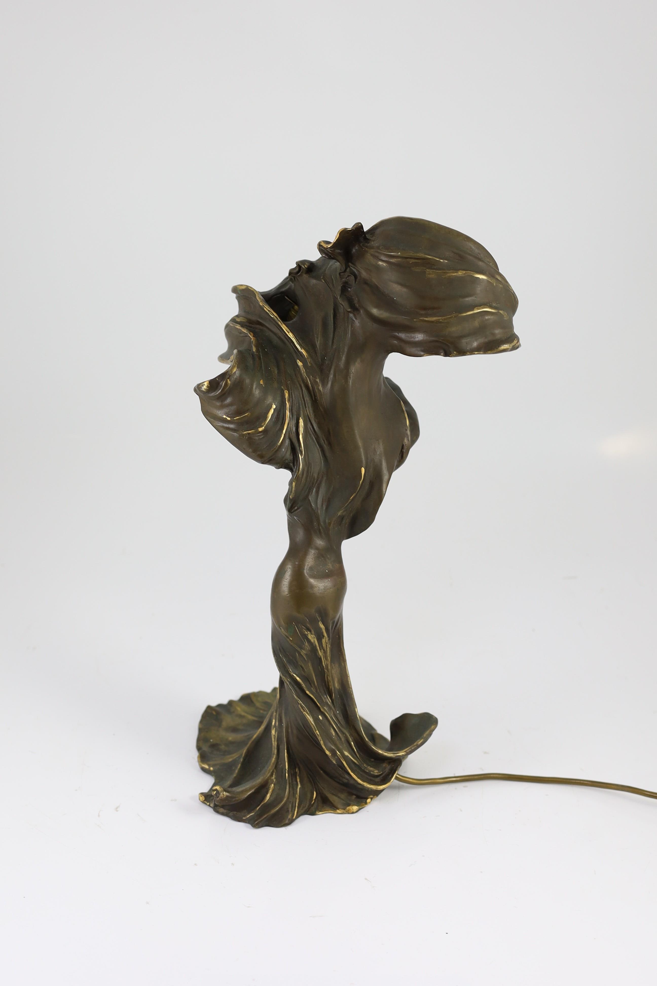 After Raoul Larche (1860-1912). A bronze 'Loie Fuller' table lamp, height 43cm